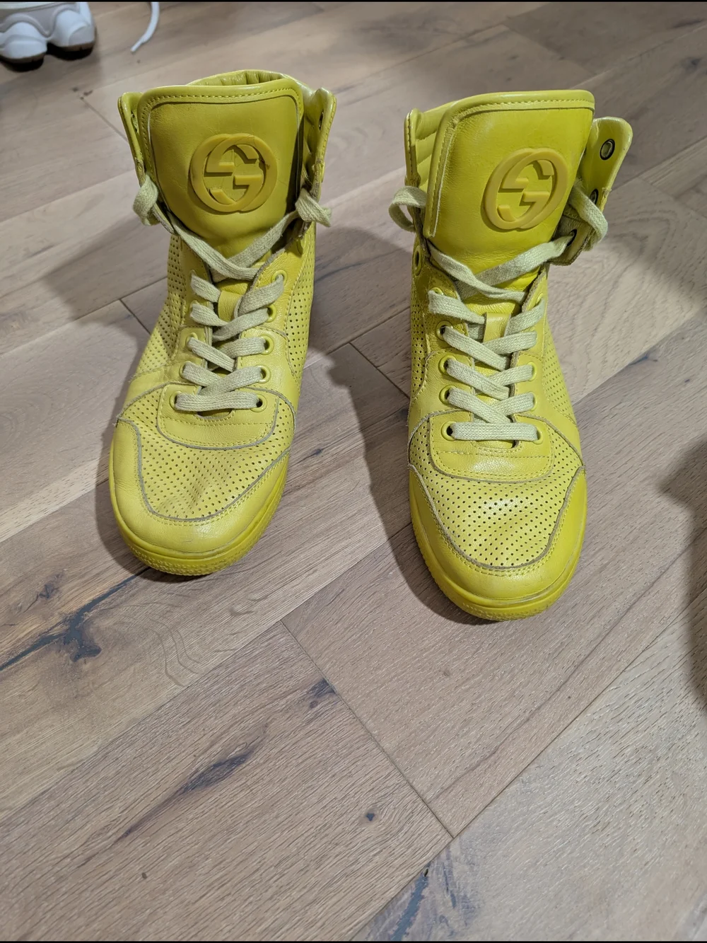 Gucci Yellow High-Top Sneakers with Raised Logo
